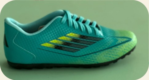 Chuteira infantil verde para futebol