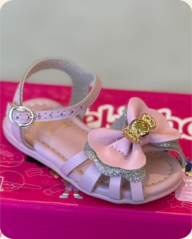 Sandália infantil rosa com laço floral